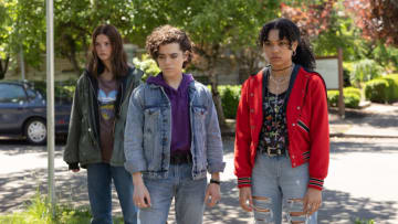 THE GIRL IN THE WOODS -- "The Door in the Woods" Episode 102 -- Pictured: (l-r) Stefanie Scott as Carrie Ecker, Misha Osherovich as Nolan Frisk, Sofia Bryant as Tasha Gibson -- (Photo by: Scott Green/Peacock)