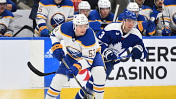 Nov 19, 2022; Toronto, Ontario, CAN; Buffalo Sabres forward Jeff Skinner (53) skates the puck away from Toronto Maple Leafs defenseman Justin Holl (3) in the first period at Scotiabank Arena. Mandatory Credit: Dan Hamilton-USA TODAY Sports