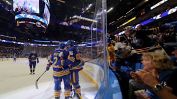 Oct 14, 2021; Buffalo, New York, USA; Buffalo Sabres left wing Anders Bjork (96) celebrates his goal with teammates during the second period against the Montreal Canadiens at KeyBank Center. Mandatory Credit: Timothy T. Ludwig-USA TODAY Sports