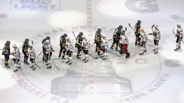 EDMONTON, ALBERTA - AUGUST 18: The Vegas Golden Knights and the Chicago Blackhawks shake hands after the Golden Knights victory in Game Five of the Western Conference First Round during the 2020 NHL Stanley Cup Playoffs at Rogers Place on August 18, 2020 in Edmonton, Alberta, Canada. The Golden Knights defeated the Blackhawks 3-2 to win the series 4-1.