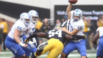 IOWA CITY, IOWA- SEPTEMBER 28: Defensive tackle Daviyon Nixon #54 of the Iowa Hawkeyes makes a sack during the first half on quarterback Asher OHara #10 of the Middle Tennessee Blue Raiders on September 28, 2019 at Kinnick Stadium in Iowa City, Iowa. (Photo by Matthew Holst/Getty Images)
