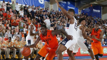 Nov 21, 2016; Lahaina, Maui, HI, USA; Oklahoma State Cowboys guard Jawun Evans (1) drives to the basket against UCONN Huskies guard Rodney Purvis (15) during the Maui Jim Maui Invitational at the Lahaina Civic Center. Mandatory Credit: Brian Spurlock-USA TODAY Sports