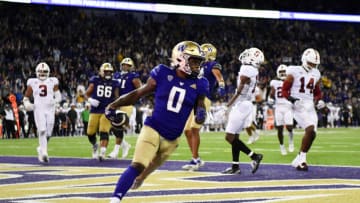 SEATTLE, WASHINGTON - SEPTEMBER 24: Giles Jackson #0 of the Washington Huskies scores a touchdown during the fourth quarter of the game against the Stanford Cardinal at Husky Stadium on September 24, 2022 in Seattle, Washington. The Washington Huskies won 40-22. (Photo by Alika Jenner/Getty Images)