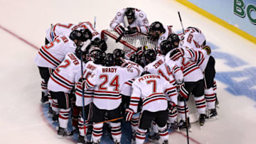 BOSTON, MA - APRIL 09: The Nebraska-Omaha Mavericks huddle around their goal before their game against the Providence Friars during the 2015 NCAA Division I Men's Hockey Championship semifinals at TD Garden on April 9, 2015 in Boston, Massachusetts. (Photo by Mike Lawrie/Getty Images)