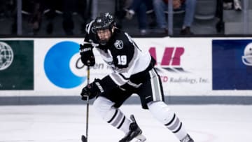 PROVIDENCE, RI - DECEMBER 30: Jake Walman #19 of the Providence College Friars skates against the Denver Pioneers during NCAA hockey at the Schneider Arena on December 30, 2016 in Providence, Rhode Island. The game ended in a 2-2 tie. (Photo by Richard T Gagnon/Getty Images)