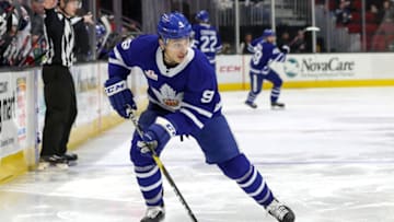 CLEVELAND, OH - NOVEMBER 28: Toronto Marlies left wing Trevor Moore (9) controls the puck during the third period of the American Hockey League game between the Toronto Marlies and Cleveland Monsters on November 28, 2018, at Quicken Loans Arena in Cleveland, OH. (Photo by Frank Jansky/Icon Sportswire via Getty Images)