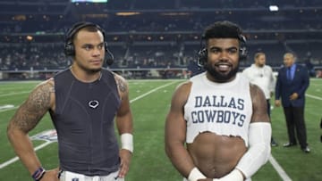 Nov 24, 2016; Arlington, TX, USA; Dallas Cowboys quarterback Dak Prescott (left) and running back Ezekiel Elliott (right) are interviewed after the win against the Washington Redskins at AT&T Stadium. The Cowboys defeat the Redskins 31-26. Mandatory Credit: Jerome Miron-USA TODAY Sports