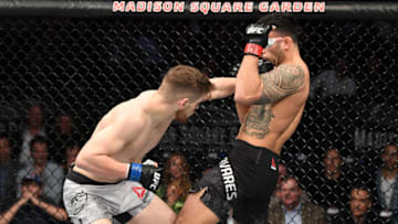 NEW YORK, NEW YORK - NOVEMBER 02: (L-R) Edmen Shahbazyan punches Brad Tavares in their middleweight bout during the UFC 244 event at Madison Square Garden on November 02, 2019 in New York City. (Photo by Josh Hedges/Zuffa LLC via Getty Images)