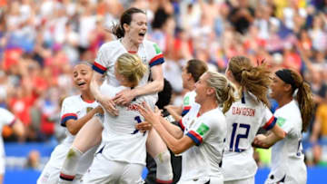 TOPSHOT - USA players celebrate after the final whistle during the France 2019 Womens World Cup football final match between USA and the Netherlands, on July 7, 2019, at the Lyon Stadium in Lyon, central-eastern France. (Photo by Philippe DESMAZES / AFP) (Photo credit should read PHILIPPE DESMAZES/AFP/Getty Images)