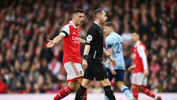 LONDON, ENGLAND - FEBRUARY 11: Granit Xhaka of Arsenal confronts match referee Peter Bankes during the Premier League match between Arsenal FC and Brentford FC at Emirates Stadium on February 11, 2023 in London, England. (Photo by Shaun Botterill/Getty Images)