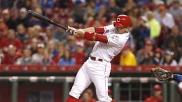 Sep 30, 2016; Cincinnati, OH, USA; Cincinnati Reds first baseman Joey Votto hits a two-run home run against the Chicago Cubs during the ninth inning at Great American Ball Park. The Cubs won 7-3. Mandatory Credit: David Kohl-USA TODAY Sports