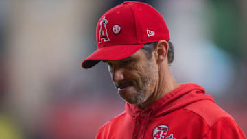 HOUSTON, TX - SEPTEMBER 22: Los Angeles Angels manager Brad Ausmus (12) walks back to the dugout after a mound visit in the fifth inning of a baseball between the Houston Astros and the Los Angeles Angels on September, 22, 2019, at Minute Maid Park in Houston, TX. (Photo by Juan DeLeon/Icon Sportswire via Getty Images)