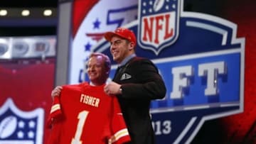 Apr 25, 2013; New York, NY, USA; NFL commissioner Roger Goodell (left) introduces Eric Fisher (Central Michigan) as the number one overall pick to the Kansas City Chiefs during the 2013 NFL Draft at Radio City Music Hall. Mandatory Credit: Jerry Lai-USA TODAY Sports