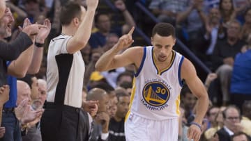 April 7, 2016; Oakland, CA, USA; Golden State Warriors guard Stephen Curry (30) celebrates after making a three-point basket during the second quarter against the San Antonio Spurs at Oracle Arena. Mandatory Credit: Kyle Terada-USA TODAY Sports