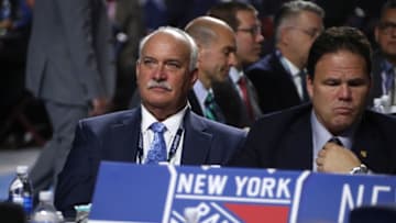 VANCOUVER, BRITISH COLUMBIA - JUNE 21: President John Davidson (L) and general manager Jeff Gorton of the New York Rangers look on from the team draft table during Rounds 2-7 of the 2019 NHL Draft at Rogers Arena on June 22, 2019 in Vancouver, Canada. (Photo by Dave Sandford/NHLI via Getty Images)