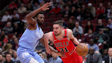 The Chicago Bulls' Tomas Satoransky (31) drives against the Minnesota Timberwolves' Andrew Wiggins (22) . (Armando L. Sanchez/Chicago Tribune/Tribune News Service via Getty Images)
