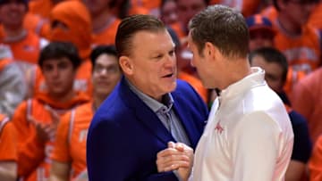 Jan 31, 2023; Champaign, Illinois, USA; Illinois Fighting Illini head coach Brad Underwood (left) and Nebraska Cornhuskers head coach Fred Hoiberg (right) shake hands before the game at State Farm Center. Mandatory Credit: Ron Johnson-USA TODAY Sports