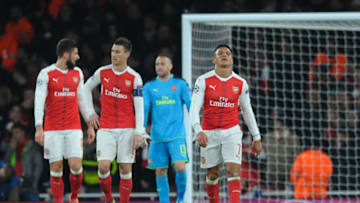 (R-L) Alexis Sanchez of Arsenal and David Ospina of Arsenal and Laurent Koscielny of Arsenal and Olivier Giroud of Arsenal look dejected during the Champions League match between Arsenal and Paris Saint Germain at Emirates Stadium on November 23, 2016 in London, England. ( Photo by Andre Ferreira / Icon Sport ) (Photo by Andre Ferreira/Icon Sport via Getty Images)