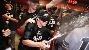 CLEVELAND, OH - OCTOBER 11: The New York Yankees celebrate in the locker room after their 5 to 2 win over the Cleveland Indians in Game Five of the American League Divisional Series at Progressive Field on October 11, 2017 in Cleveland, Ohio. (Photo by Gregory Shamus/Getty Images)