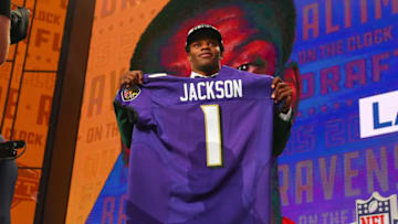 ARLINGTON, TX - APRIL 26: Lamar Jackson holds up a jersey after being chosen by the Baltimore Ravens with the 32nd pick during the first round at the 2018 NFL Draft at AT&T Statium on April 26, 2018 at AT&T Stadium in Arlington Texas. (Photo by Rich Graessle/Icon Sportswire via Getty Images)