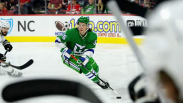 RALEIGH, NC - JANUARY 11: Erik Haula #56 of the Carolina Hurricanes controls the puck on the ice during an NHL game against the Los Angeles Kings on January 11, 2020 at PNC Arena in Raleigh, North Carolina. (Photo by Gregg Forwerck/NHLI via Getty Images)
