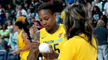 INDIANAPOLIS, IN - AUGUST 18: Cappie Pondexter #25 of the Indiana Fever signs a ball after the game against the Chicago Sky on August 18, 2018 at Bankers Life Fieldhouse in Indianapolis, Indiana. NOTE TO USER: User expressly acknowledges and agrees that, by downloading and or using this Photograph, user is consenting to the terms and conditions of the Getty Images License Agreement. Mandatory Copyright Notice: Copyright 2018 NBAE (Photo by Ron Hoskins/NBAE via Getty Images)