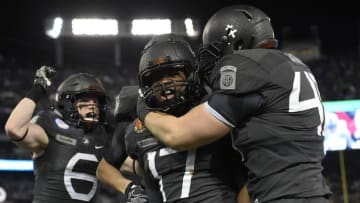 Dec 10, 2016; Baltimore, MD, USA; Army Black Knights quarterback Ahmad Bradshaw (17) celebrates with teammates after scoring a touchdown during then fourth quarter of the 117 annual Army Navy game against the Navy Midshipmen at M&T Bank Stadium. Army Black Knights defeated Navy Midshipmen 21-17. Mandatory Credit: Tommy Gilligan-USA TODAY Sports