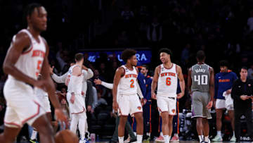 NEW YORK, NEW YORK - DECEMBER 11: Miles McBride #2 and Quentin Grimes #6 of the New York Knicks celebrate after defeating the Sacramento Kings at Madison Square Garden on December 11, 2022 in New York City. NOTE TO USER: User expressly acknowledges and agrees that, by downloading and or using this photograph, User is consenting to the terms and conditions of the Getty Images License Agreement. (Photo by Dustin Satloff/Getty Images)