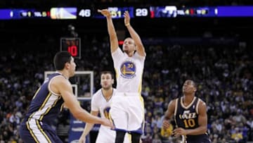 Nov 16, 2013; Oakland, CA, USA; Golden State Warriors guard Stephen Curry (30) attempts a shot against the Utah Jazz in the second quarter at Oracle Arena. Mandatory Credit: Cary Edmondson-USA TODAY Sports