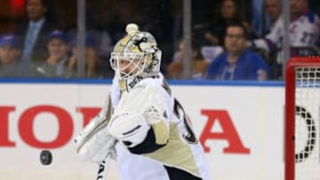 Apr 19, 2016; New York, NY, USA; Pittsburgh Penguins goalie Matt Murray (30) makes a save against the New York Rangers during the second period of game three of the first round of the 2016 Stanley Cup Playoffs at Madison Square Garden. Mandatory Credit: Brad Penner-USA TODAY Sports