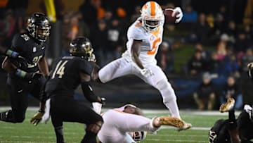 Nov 26, 2016; Nashville, TN, USA; Tennessee Volunteers running back Alvin Kamara (6) hurdles a teammate for a short gain during the first half against the Vanderbilt Commodores at Vanderbilt Stadium. Mandatory Credit: Christopher Hanewinckel-USA TODAY Sports