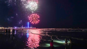 GALVESTON, TX - JUNE 19: People watch a Juneteenth fireworks show on June 19, 2021 in Galveston, Texas. Juneteenth marks the emancipation of enslaved African American people in the United States and the Juneteenth National Independence Day became the 12th legal federal holiday signed on June 17th, 2021. (Photo by Go Nakamura/Getty Images)