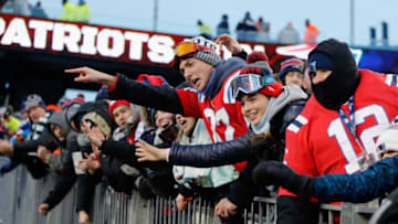 FOXBORO, MA - DECEMBER 31: New England Patriots fans celebrate after the Patriots defeated the New York Jets 26-6 at Gillette Stadium on December 31, 2017 in Foxboro, Massachusetts. (Photo by Jim Rogash/Getty Images)