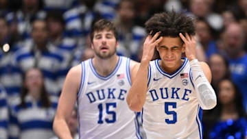 Duke basketball forward Ryan Young and guard Tyrese Proctor (Photo by Grant Halverson/Getty Images)