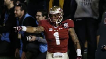 Jan 6, 2014; Pasadena, CA, USA; Florida State Seminoles wide receiver Kelvin Benjamin (1) celebrates after scoring a touchdown against the Auburn Tigers during the second half of the 2014 BCS National Championship game at the Rose Bowl. Mandatory Credit: Kelvin Kuo-USA TODAY Sports