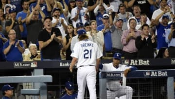 October 15, 2015; Los Angeles, CA, USA; Los Angeles Dodgers starting pitcher Zack Greinke (21) returns to the dugout after being relieved in the seventh inning against New York Mets in game five of NLDS at Dodger Stadium. Mandatory Credit: Richard Mackson-USA TODAY Sports
