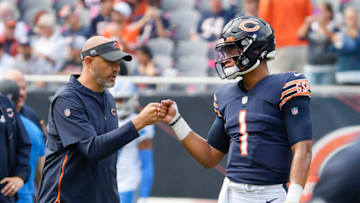 Oct 3, 2021; Chicago, Illinois, USA; Chicago Bears head coach Matt Nagy and Chicago Bears quarterback Justin Fields (1) shake hands before the game against the Detroit Lions at Soldier Field. Mandatory Credit: Quinn Harris-USA TODAY Sports