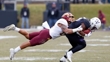 EVANSTON, ILLINOIS - NOVEMBER 23: Malik Washington #14 of the Northwestern Wildcats catches a pass in front of Antoine Winfield Jr. #11 of the Minnesota Golden Gophers during the first half at Ryan Field on November 23, 2019 in Evanston, Illinois. (Photo by Nuccio DiNuzzo/Getty Images)