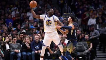 DENVER, CO - FEBRUARY 03: Draymond Green #23 of the Golden State Warriors posts up Jamal Murray #27 of the Denver Nuggets at Pepsi Center on February 3, 2018 in Denver, Colorado. NOTE TO USER: User expressly acknowledges and agrees that, by downloading and or using this photograph, User is consenting to the terms and conditions of the Getty Images License Agreement. (Photo by Jamie Schwaberow/Getty Images)