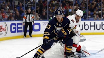 Nov 9, 2016; Buffalo, NY, USA; Ottawa Senators defenseman Marc Methot (3) tries to defend Buffalo Sabres center Sam Reinhart (23) as he skates with the puck during the second period at KeyBank Center. Mandatory Credit: Timothy T. Ludwig-USA TODAY Sports