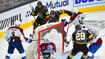 Jun 6, 2021; Las Vegas, Nevada, USA; Vegas Golden Knights left wing William Carrier (28) scores a third period goal against Colorado Avalanche goaltender Philipp Grubauer (31)in game four of the second round of the 2021 Stanley Cup Playoffs at T-Mobile Arena. Mandatory Credit: Stephen R. Sylvanie-USA TODAY Sports