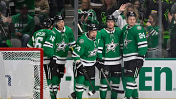 Jan 23, 2023; Dallas, Texas, USA; Dallas Stars center Joe Pavelski (16) and left wing Jason Robertson (21) and left wing Jamie Benn (14) and defenseman Miro Heiskanen (4) and center Roope Hintz (24) skate off the ice after a goal scored by Benn against the Buffalo Sabres during the first period at the American Airlines Center. Mandatory Credit: Jerome Miron-USA TODAY Sports