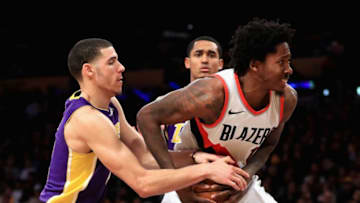 LOS ANGELES, CA - DECEMBER 23: Lonzo Ball #2 of the Los Angeles Lakers attempts to strip the ball from Ed Davis #17 of the Portland Trail Blazers during the second half of a game at Staples Center on December 23, 2017 in Los Angeles, California. NOTE TO USER: User expressly acknowledges and agrees that, by downloading and or using this photograph, User is consenting to the terms and conditions of the Getty Images License Agreement. (Photo by Sean M. Haffey/Getty Images)
