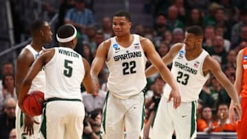 DETROIT, MI - MARCH 18: Miles Bridges #22 of the Michigan State Spartans high fives Cassius Winston #5 during the first half against the Syracuse Orange in the second round of the 2018 NCAA Men's Basketball Tournament at Little Caesars Arena on March 18, 2018 in Detroit, Michigan. (Photo by Gregory Shamus/Getty Images)