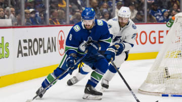 Mar 13, 2022; Vancouver, British Columbia, CAN; Tampa Bay Lightning defenseman Victor Hedman (77) skates after Vancouver Canucks forward Conor Garland (8) in the third period at Rogers Arena. Tampa Bay won 2-1. Mandatory Credit: Bob Frid-USA TODAY Sports