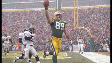 31 Dec 1995: Tight end Mark Chmura of the Green Bay Packes celebrates after scoring a touchdown against the Atlanta Falcons at Lambeau Field in Green Bay, Wisconsin. The Packers won the game 37-20. Mandatory Credit: Brian Bahr /Allsport