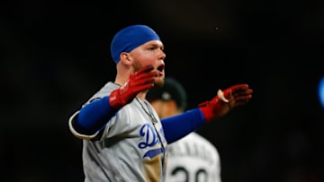 DENVER, CO - APRIL 6: Alex Verdugo #27 of the Los Angeles Dodgers reacts after hitting an RBI triple during the eighth inning against the Colorado Rockies at Coors Field on April 6, 2019 in Denver, Colorado. (Photo by Justin Edmonds/Getty Images)