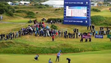 Nicolas Colsaerts of Belgium and Andrew Dodt of Australia on the 18th green during Day Three of the AAM Scottish Open at Dundonald Links Golf Course on July 15, 2017 in Troon, Scotland. (Photo by Tony Marshall/Getty Images)