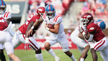 Oct 17, 2020; Fayetteville, Arkansas, USA; Ole Miss Rebels quarterback Matt Corral (2) rushes int he first quarter against the Arkansas Razorbacks at Donald W. Reynolds Razorback Stadium. Mandatory Credit: Nelson Chenault-USA TODAY Sports