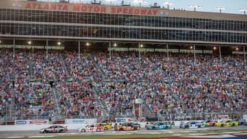 Aug 31, 2014; Hampton, GA, USA; NASCAR Sprint Cup Series driver Kevin Harvick (4) leads the field on the first lap of the Oral-B USA 500 at Atlanta Motor Speedway. Mandatory Credit: Kevin Liles-USA TODAY Sports